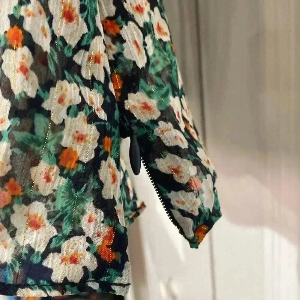 NWT Urban Outfitters sheer navy & green floral peplum top shirt blouse.